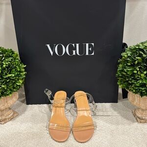 Clear medium heeled sandals with ankle wraps